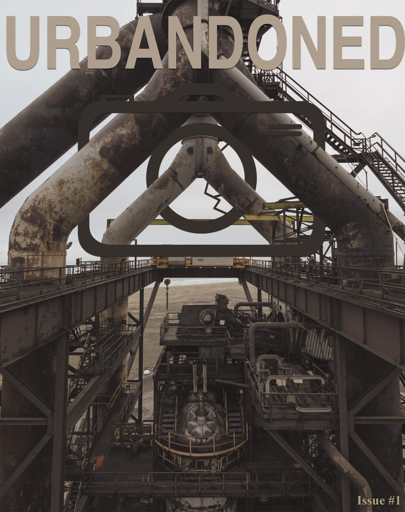 Front cover of Urbandoned Issue 1 showing rusted industrial pipework and gantries